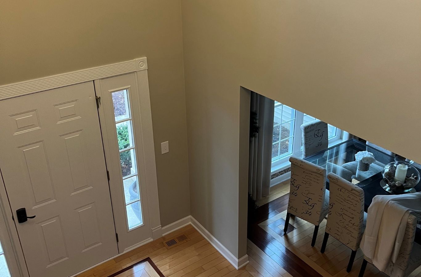 An R&J Painting team member delivering quality house painting services in Arlington Heights, showcasing the benefits of premium materials and professional techniques.