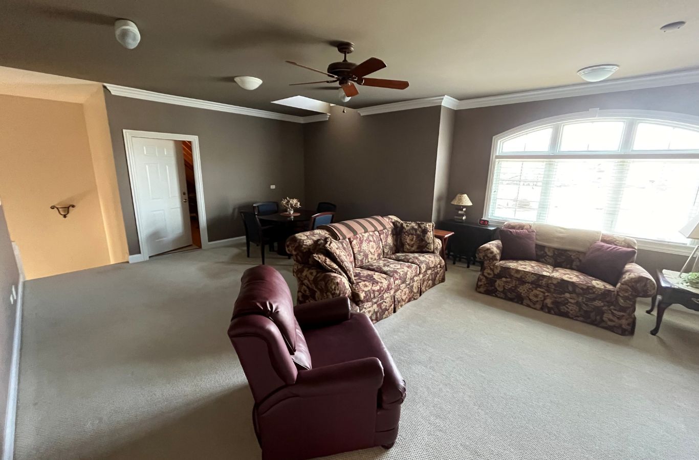 House Painting in Streamwood, IL by R&J Painting An R&J Painting professional expertly painting a house in Streamwood, IL, showcasing high-quality work and attention to detail.