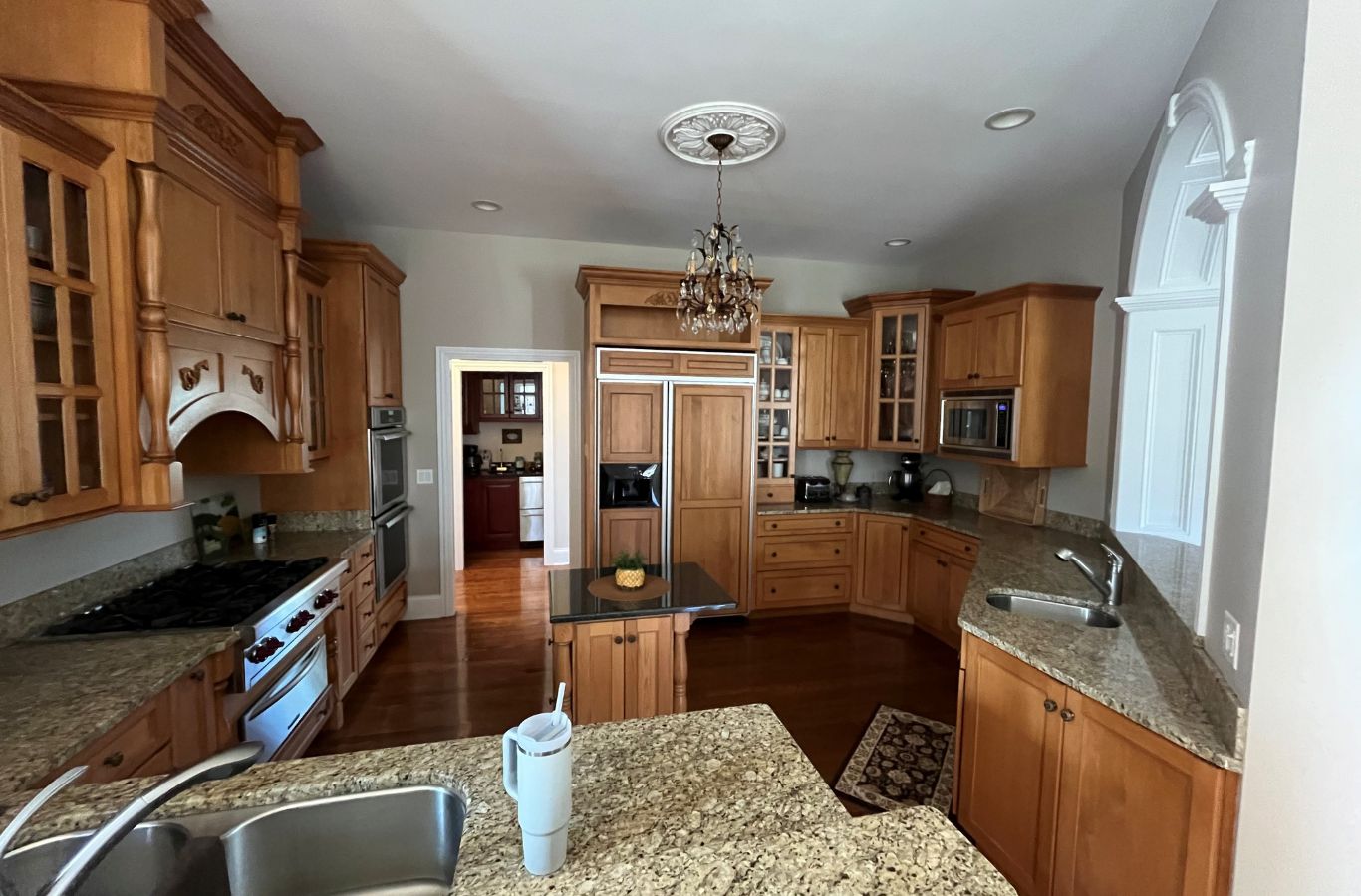 A skilled R&J Painting expert working on a Hoffman Estates home, showcasing detailed craftsmanship and professionalism. House Painting near me.