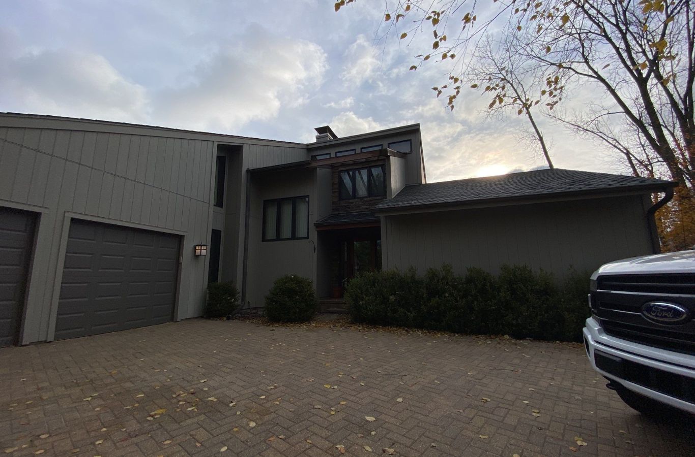 An R&J Painting employee completing a commercial painting project in Crystal Lake, IL, demonstrating expertise and precision. Commercial Painting Contractor near me.