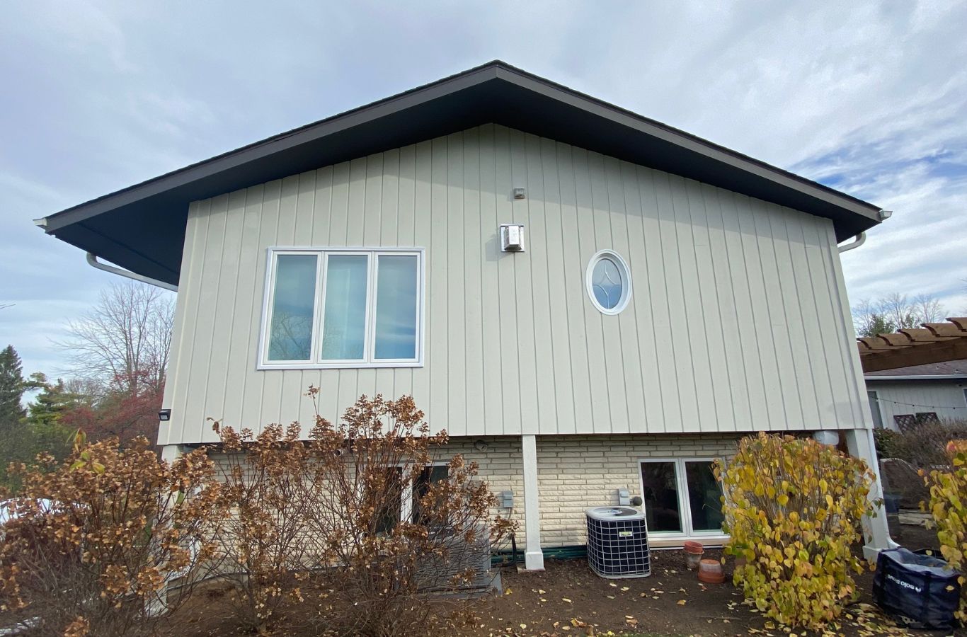 A R&J Painting team member delivering Exterior Painter services in Lake Zurich, IL, showcasing the value of professional care and long-term protection.