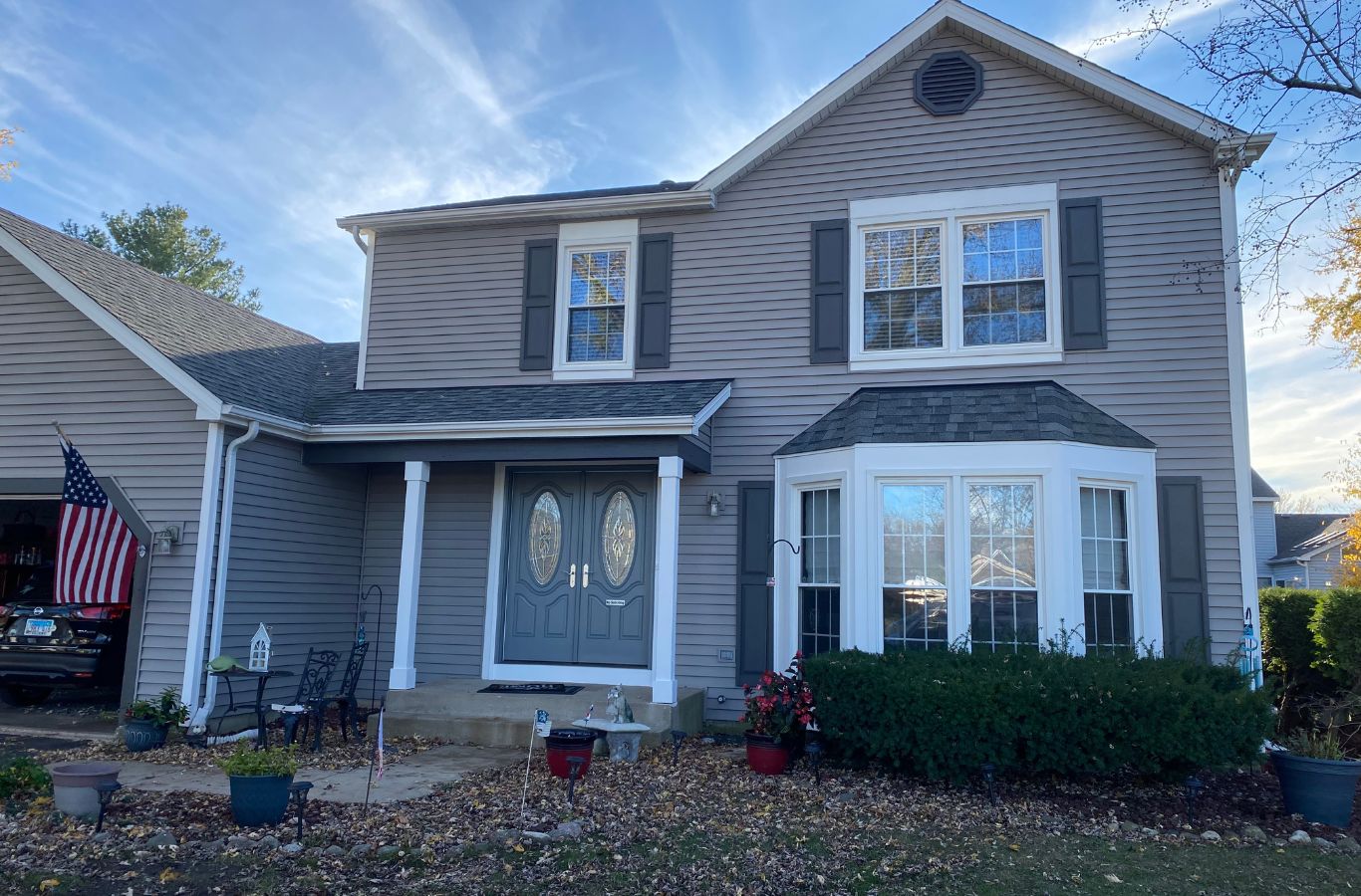 An R&J Painting expert applying exterior paint in Wauconda, IL using professional tools and techniques for a smooth, lasting finish.