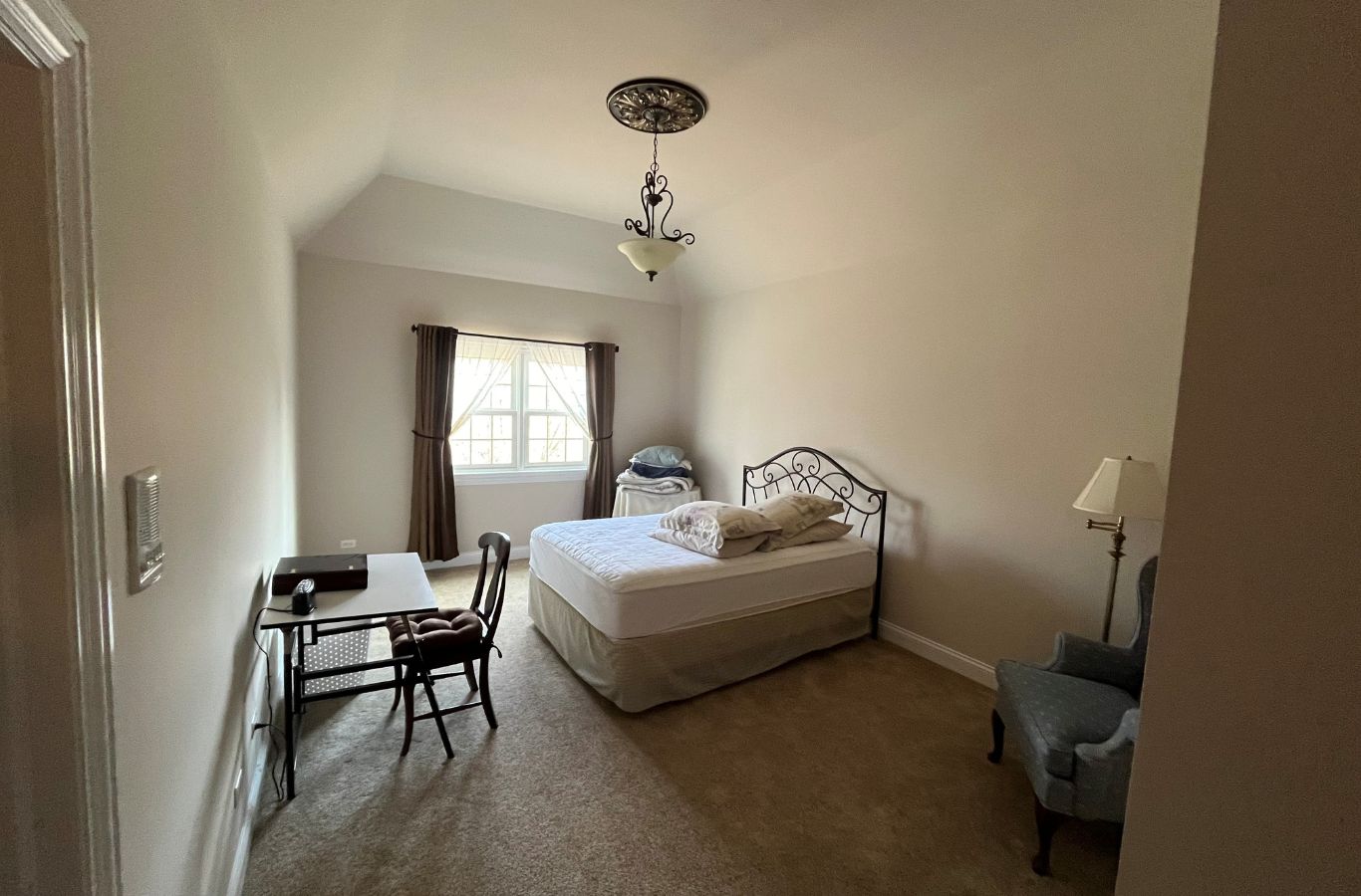 R&J Painting interior painter in Schaumburg, IL completing detailed wall finishes using professional equipment for durability.